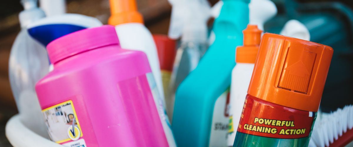Household cleaning supplies, representing the maid side of the comparison