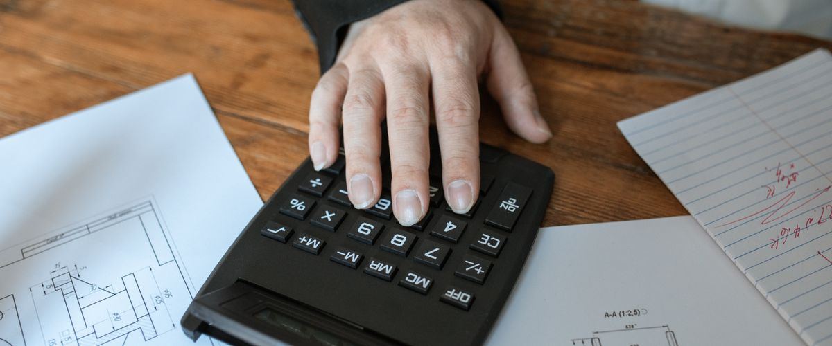 A calculator and budget notes for planning care costs