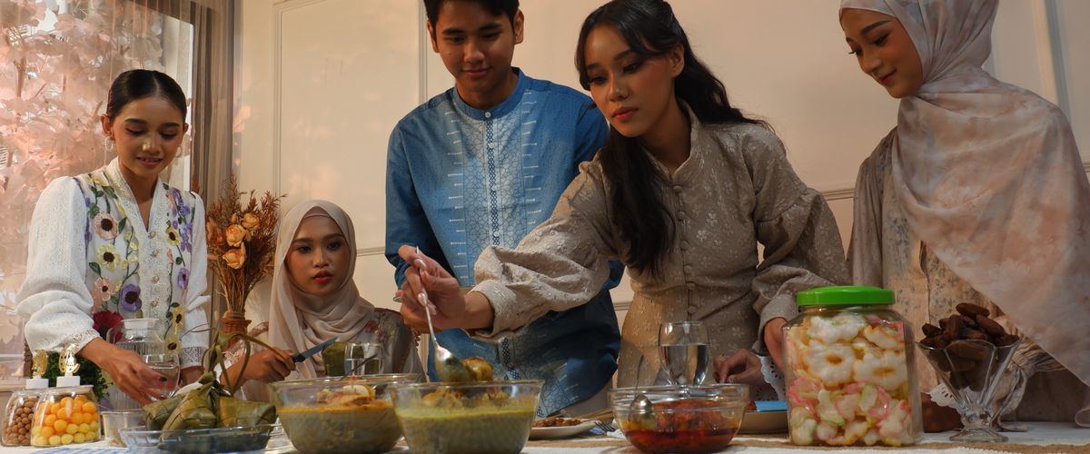 A Malaysian family sharing a meal across generations