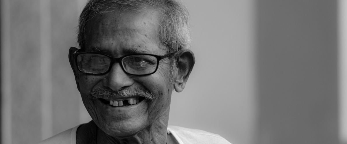 An elderly Malaysian man, the group government aid programmes serve