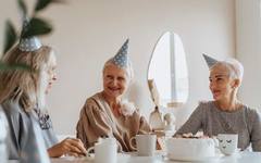 Seniors chatting over tea at a day care centre