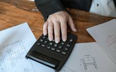 A calculator and budget notes for planning care costs