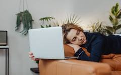 An exhausted family caregiver taking a moment to rest