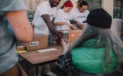 Volunteers helping at a charity home for the elderly