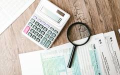 Tax forms and receipts for claiming parent-care relief